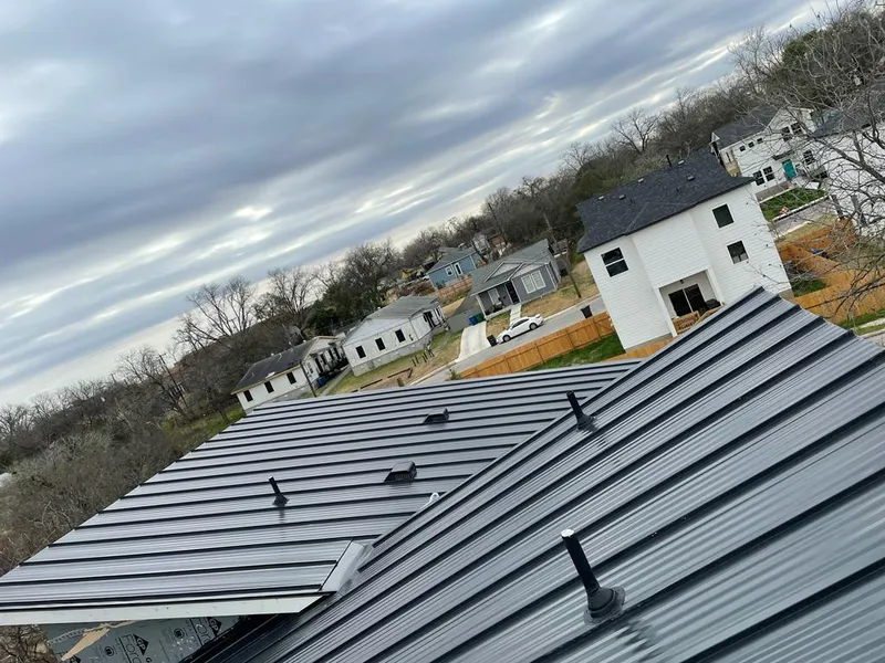 Standing seam metal roof panels with vents for Skylight Repair in Mocksville